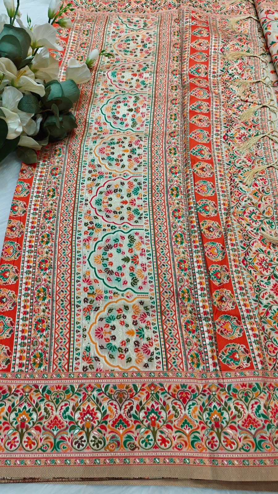 Off White Soft Pashmina Silk Saree With Orange, Green & Red Woven Design